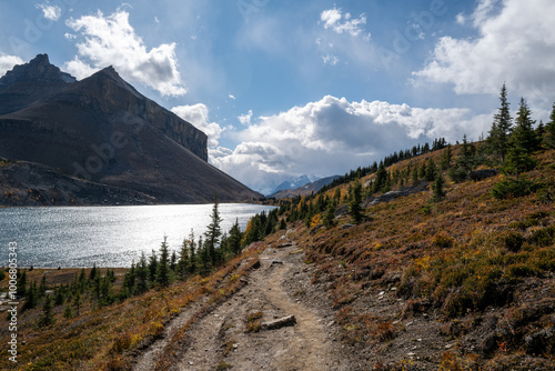 Ptarmigan Lake and Mount Redoubt on a sunny Autumn day with Deception Pass trail in frame.