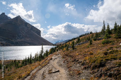 Ptarmigan Lake and Mount Redoubt on a sunny Autumn day with Deception Pass trail in frame.