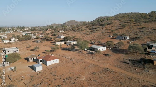 aerial view african village , typical Southern african rural area, mountain range and hills, village Botswana, South Africa