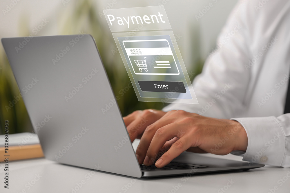 Online payment system interface over computer. Man working on laptop at desk, closeup Online payment system interface over computer. Man working on laptop at desk, closeup