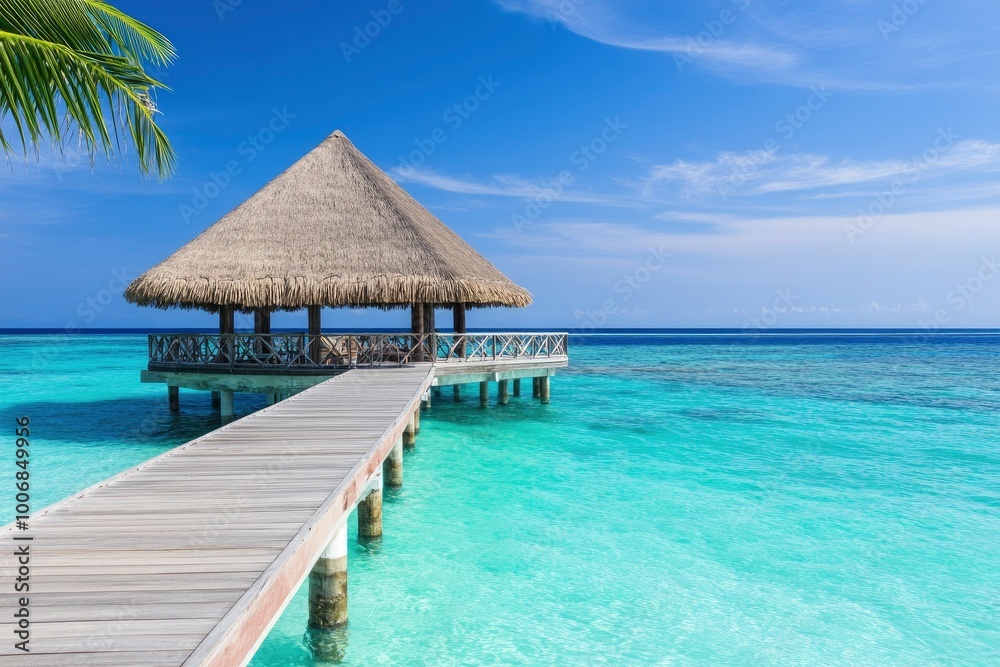 Beautiful blue sea and a wooden pier with a thatched roof on a tropical island. Beautiful blue sea and a wooden pier with a thatched roof on a tropical island.
