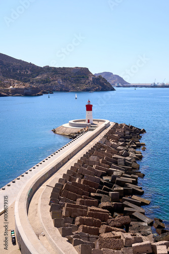 Lighthouse the end of a maritime breakwater.