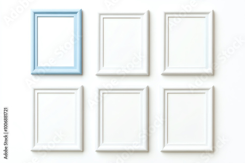 Empty picture frames arranged on a white background for creative display.