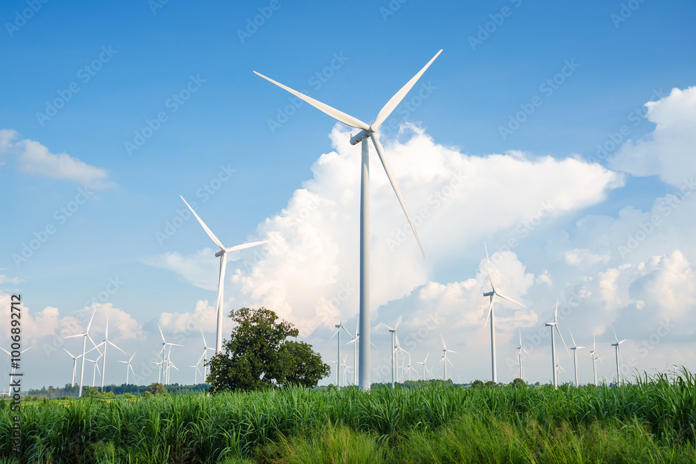 Wind turbines generating clean energy in a rural landscape, symbolizing sustainability and renewable power sources for an eco-friendly future with clear blue sky and nature in the background Wind turbines generating clean energy in a rural landscape, symbolizing sustainability and renewable power sources for an eco-friendly future with clear blue sky and nature in the background