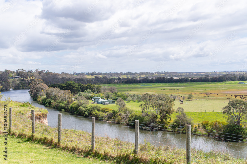 Obraz premium Panoramic View of Serene River and Rural Landscape, Eagle Point Gippsland Lakes Reserve, Australia
