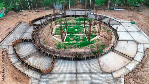 A Thai temple in Prakhon Chai district is surrounded by a verdant garden. photo