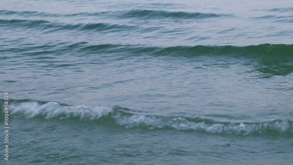 Small waves on the sea, close-up. Water surface. Small waves on the sea, close-up. Water surface.