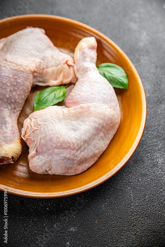 raw chicken legs meat chicken thighs poultry flesh on the bone gourmet fresh meal food snack on the table copy space food background rustic top view photo