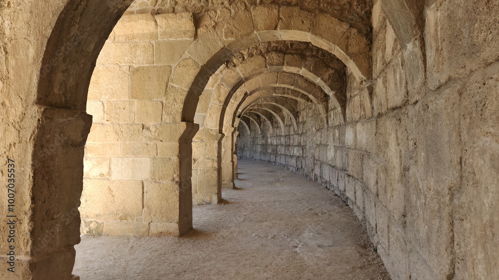 Arched stone corridor at theupper part of the Aspendos Ancient Theatre Arched stone corridor at theupper part of the Aspendos Ancient Theatre