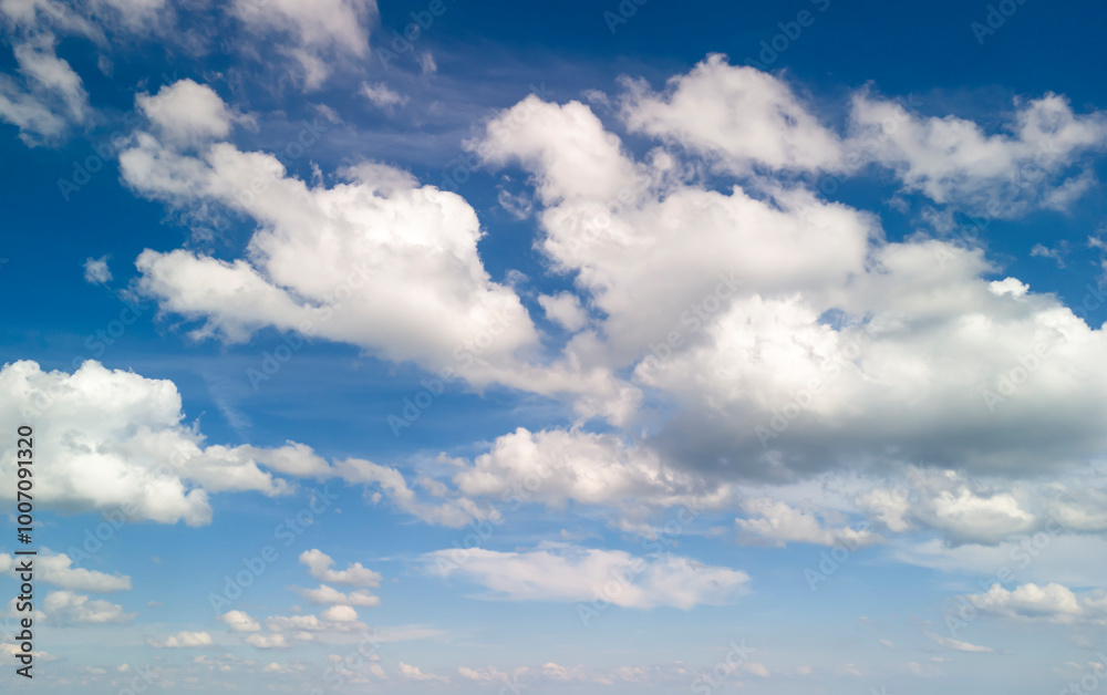 Beautiful sky with fluffy clouds on a sunny day, creating a serene and peaceful atmosphere. Perfect for nature lovers and as a background for various projects. Beautiful sky with fluffy clouds on a sunny day, creating a serene and peaceful atmosphere. Perfect for nature lovers and as a background for various projects.