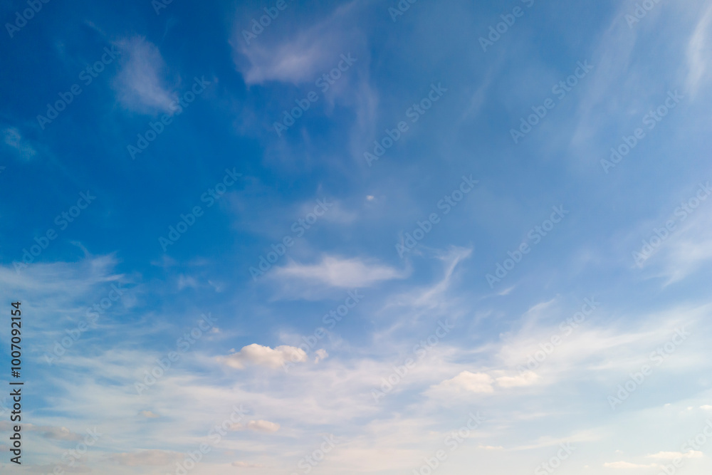 A serene blue sky with wispy clouds creates a peaceful atmosphere, ideal for backgrounds or nature-themed designs. A serene blue sky with wispy clouds creates a peaceful atmosphere, ideal for backgrounds or nature-themed designs.
