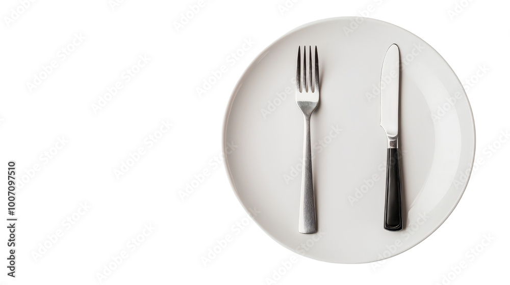 Minimalistic table setting featuring a fork and knife on a white plate, ideal for presentations related to dining or cooking. Minimalistic table setting featuring a fork and knife on a white plate, ideal for presentations related to dining or cooking.