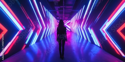 a woman standing in a tunnel of neon lights
