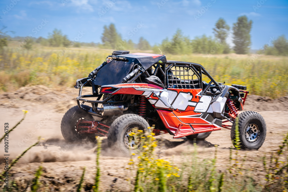 Outdoor activities UTV buggy moves on dusty road. 4x4, extreme, adrenalin. Outdoor activities UTV buggy moves on dusty road. 4x4, extreme, adrenalin.