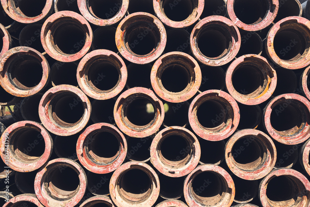 many pipes lie on top of each other many pipes lie on top of each other