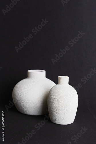 white ceramic jug on black