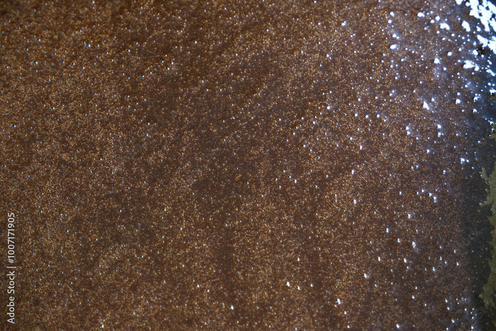 Chocolate melt background. Close-up dark chocolate texture for baking brownie. Concept of rough texture, dessert, food, cacao, sweet, and homemade cooking. Food texture background of melt chocolate. Chocolate melt background. Close-up dark chocolate texture for baking brownie. Concept of rough texture, dessert, food, cacao, sweet, and homemade cooking. Food texture background of melt chocolate.