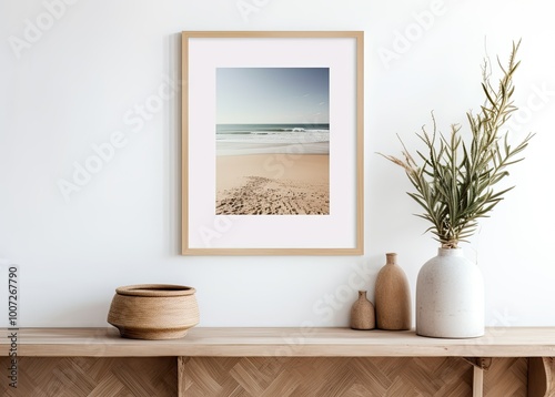 Framed Beach Photography with Vases and a Woven Bowl on a Wooden Shelf