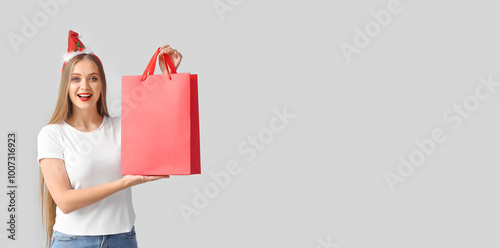 Beautiful young woman with ...