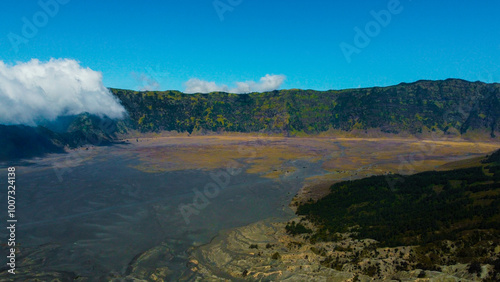 Crater of Bromo volcano and Ganesha altar with offerings in Bromo Tengger Semeru National Park, East Java, Indonesia. Erupting and active volcano photo