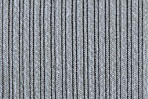 Gray melange ribbed knit fabric pattern close up as background