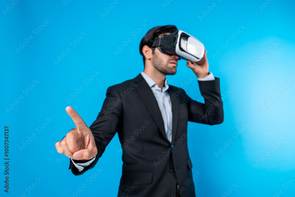 Smart manager looking at data by using VR goggle while pointing at data analysis. Caucasian investor connect metaverse while wearing suit and virtual reality headset. Innovation technology. Deviation. Smart manager looking at data by using VR goggle while pointing at data analysis. Caucasian investor connect metaverse while wearing suit and virtual reality headset. Innovation technology. Deviation.