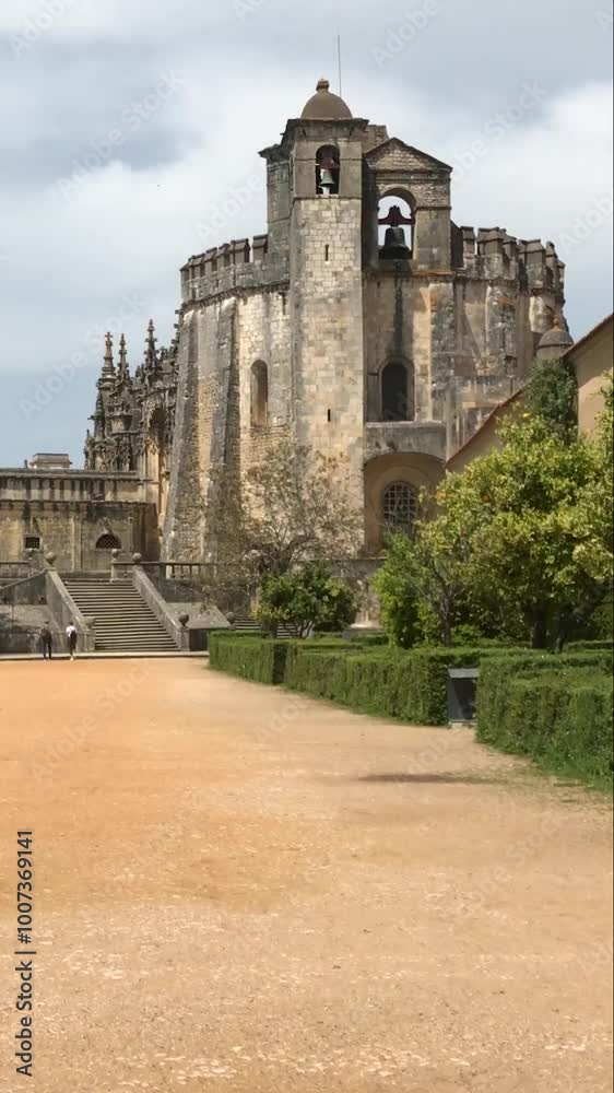 Templar Castle of Tomar, also known as the Convent of Christ, that served as a fortress for the Knights Templar, showcasing stunning medieval architecture. Vertical video Templar Castle of Tomar, also known as the Convent of Christ, that served as a fortress for the Knights Templar, showcasing stunning medieval architecture. Vertical video