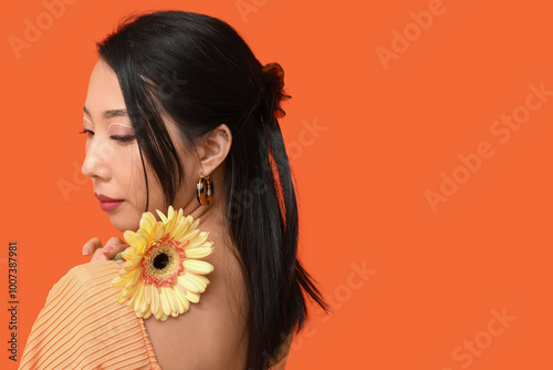 Beautiful young Asian woman...