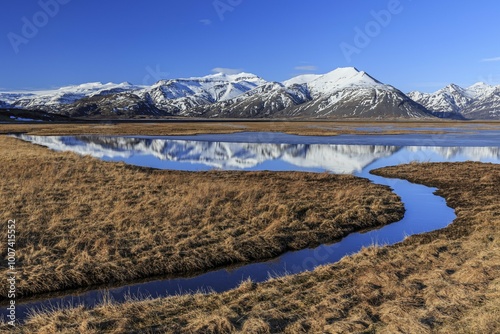 Mountains reflected in moor, winter, sunny, Skaftafell National Park, Iceland, Europe photo