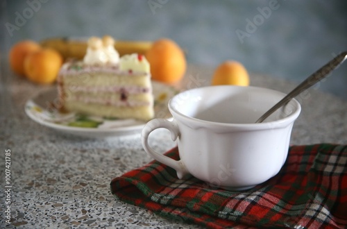 cup of coffee and cake on the table