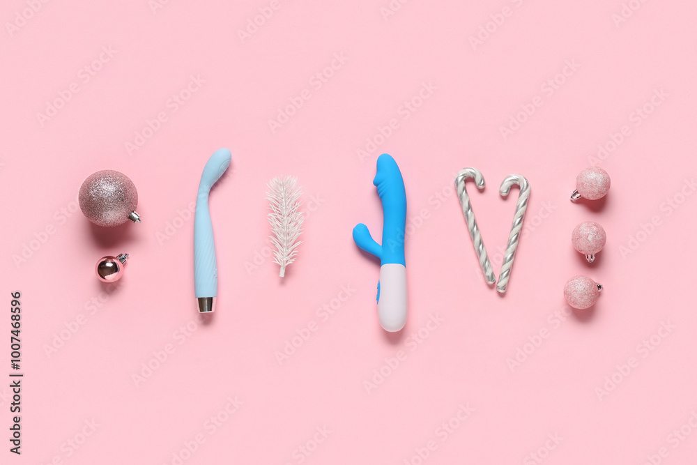 Composition with vibrators and beautiful Christmas decorations on pink background Composition with vibrators and beautiful Christmas decorations on pink background