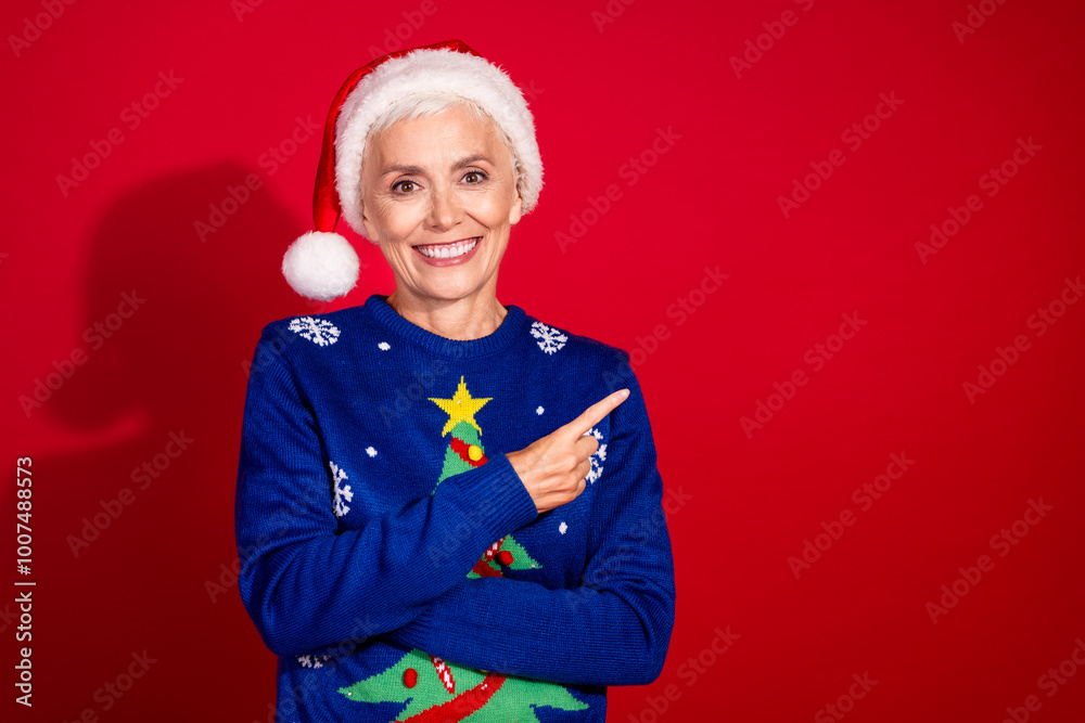 Photo of attractive nice woman wear stylish sweater recommend empty space isolated on red color background Photo of attractive nice woman wear stylish sweater recommend empty space isolated on red color background