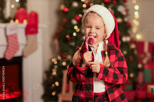 Cute little girl in Santa h...