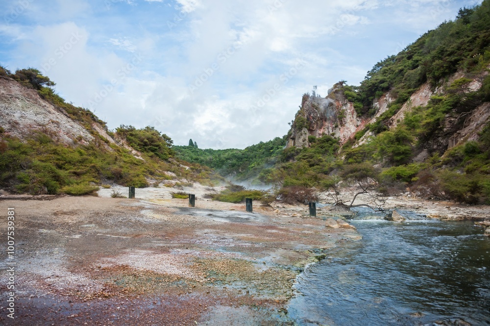 Volcanic landscape with geothermal pools and lush vegitation at War-O-Tapu Rotorua New Zealand Volcanic landscape with geothermal pools and lush vegitation at War-O-Tapu Rotorua New Zealand