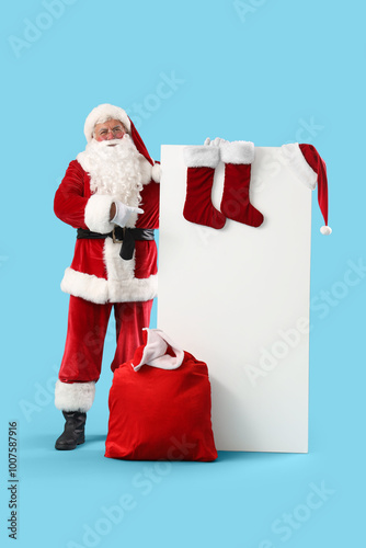 Santa claus pointing at bla...