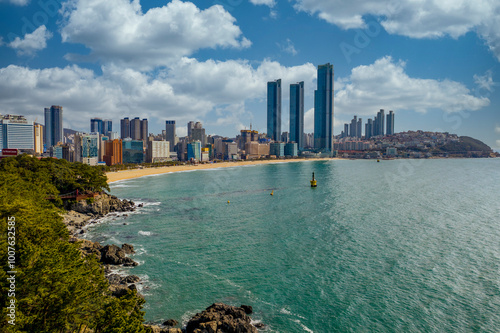 Haeundae-gu, Busan, South Korea - March 21, 2020: Aerial view of Dongbaek island with Haeundae beach  photo