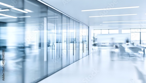 dynamic corporate lobby filled with people reflecting modern professionalism and constant movement in a glass-covered environment