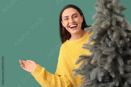 Smiling young woman in yell...