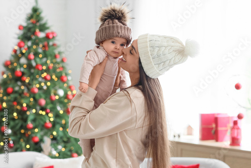 Joyful mother and baby in w...