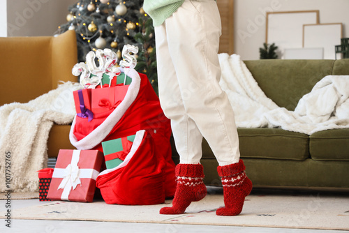 Woman in warm red socks at ...