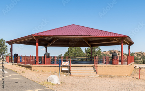 A closed outdoor picnic pavilion in a park a Watson Lake in Prescott, Arizona, USA on a sunny summer day