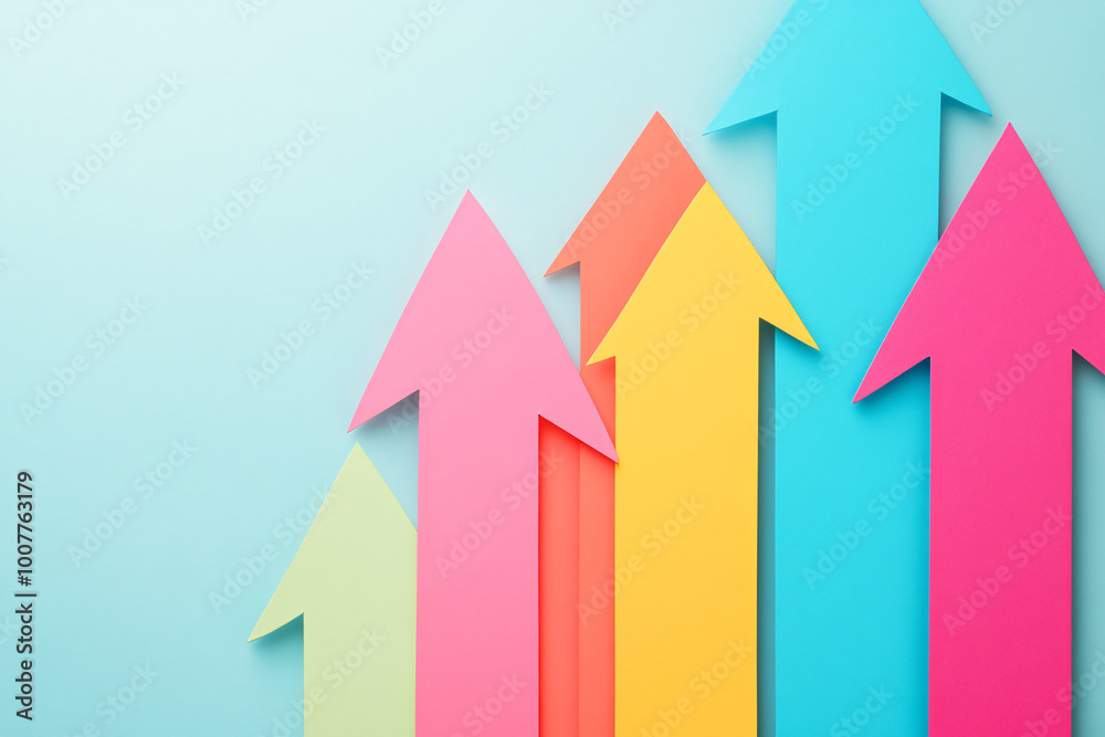 colorful paper arrows pointing upwards on blue background -  business growth, success, and upward trend concept.