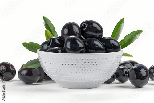 A close up of a bowl of black olives
Jamun in a Bowl with Leaves on White Background Known as Java Plum
