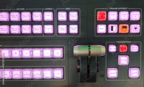 Top view of console bar and buttons of Video switcher in broadcast television production studio.
