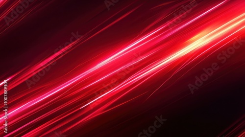 Abstract image featuring dynamic red light streaks, evoking energy and motion.