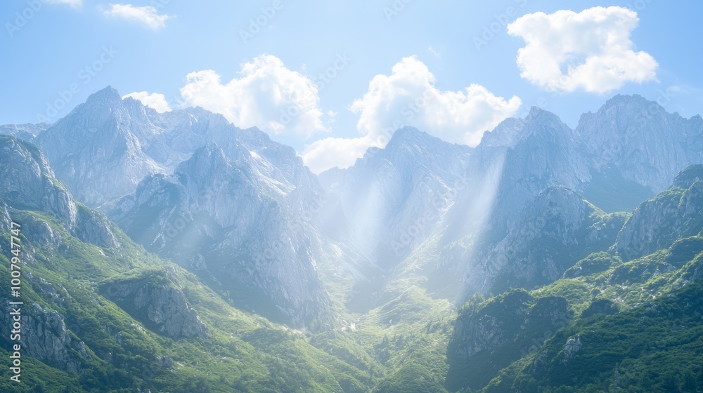 Fototapeta premium Majestic Peaks: A Stunning Display of a Dramatic Mountain Range with Jagged Summits and Deep Valleys