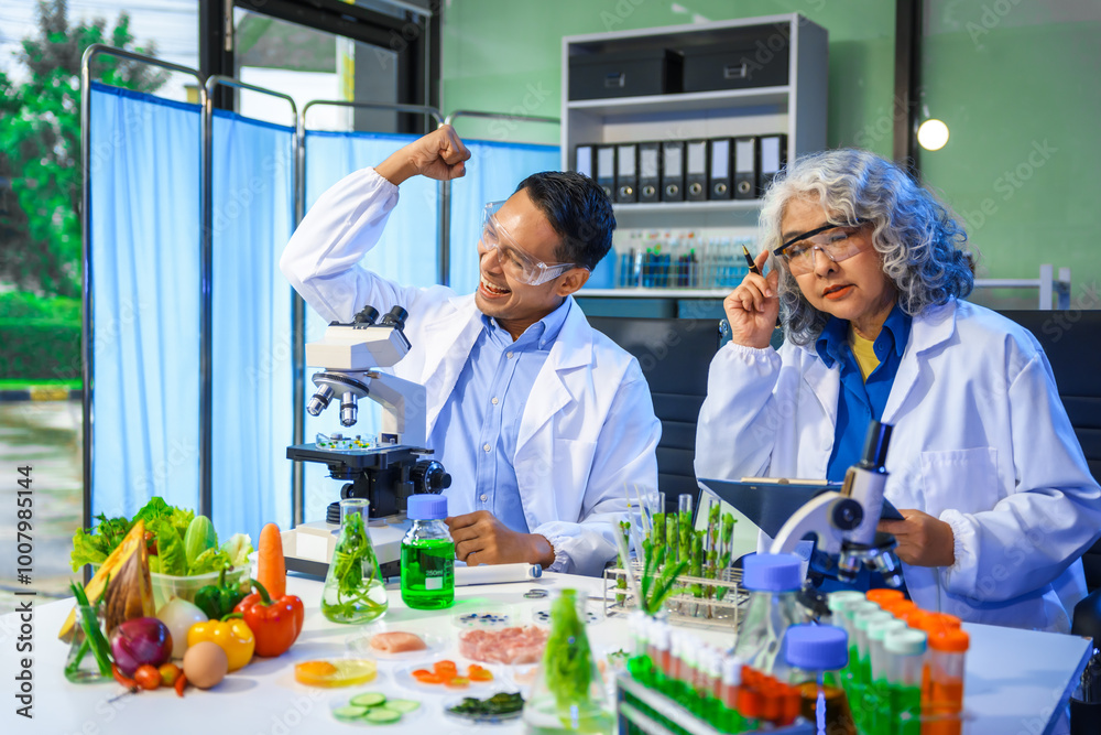 A reliable middle-aged Asian male researcher collaborates with experienced gray-haired elderly Asian female nutritionist in laboratory, food ingredients, extracts, their impact on nutrition health. A reliable middle-aged Asian male researcher collaborates with experienced gray-haired elderly Asian female nutritionist in laboratory, food ingredients, extracts, their impact on nutrition health.