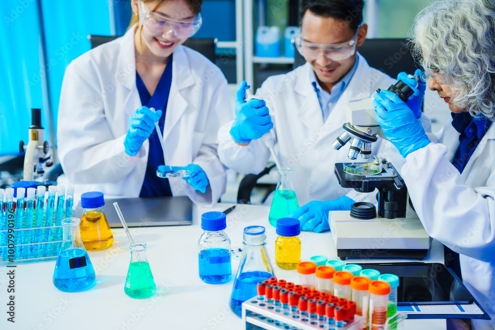 A reliable middle-aged Asian male researcher collaborates with experienced gray-haired elderly Asian female nutritionist in laboratory, food ingredients, extracts, their impact on nutrition health. A reliable middle-aged Asian male researcher collaborates with experienced gray-haired elderly Asian female nutritionist in laboratory, food ingredients, extracts, their impact on nutrition health.