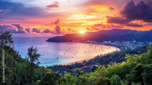 Fototapeta samoprzylepna The stunning view of Patong Beach at sunset, with golden sands and vibrant nightlife in the background.