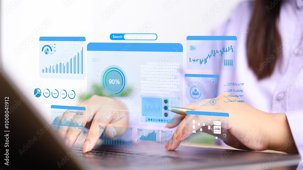 Businesswoman using computer for development and Analytics Data technology management System for report marketing strategy planning. graph analysis and information on a futuristic virtual screen. Businesswoman using computer for development and Analytics Data technology management System for report marketing strategy planning. graph analysis and information on a futuristic virtual screen.
